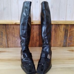 Unique tall pull on leather boots.